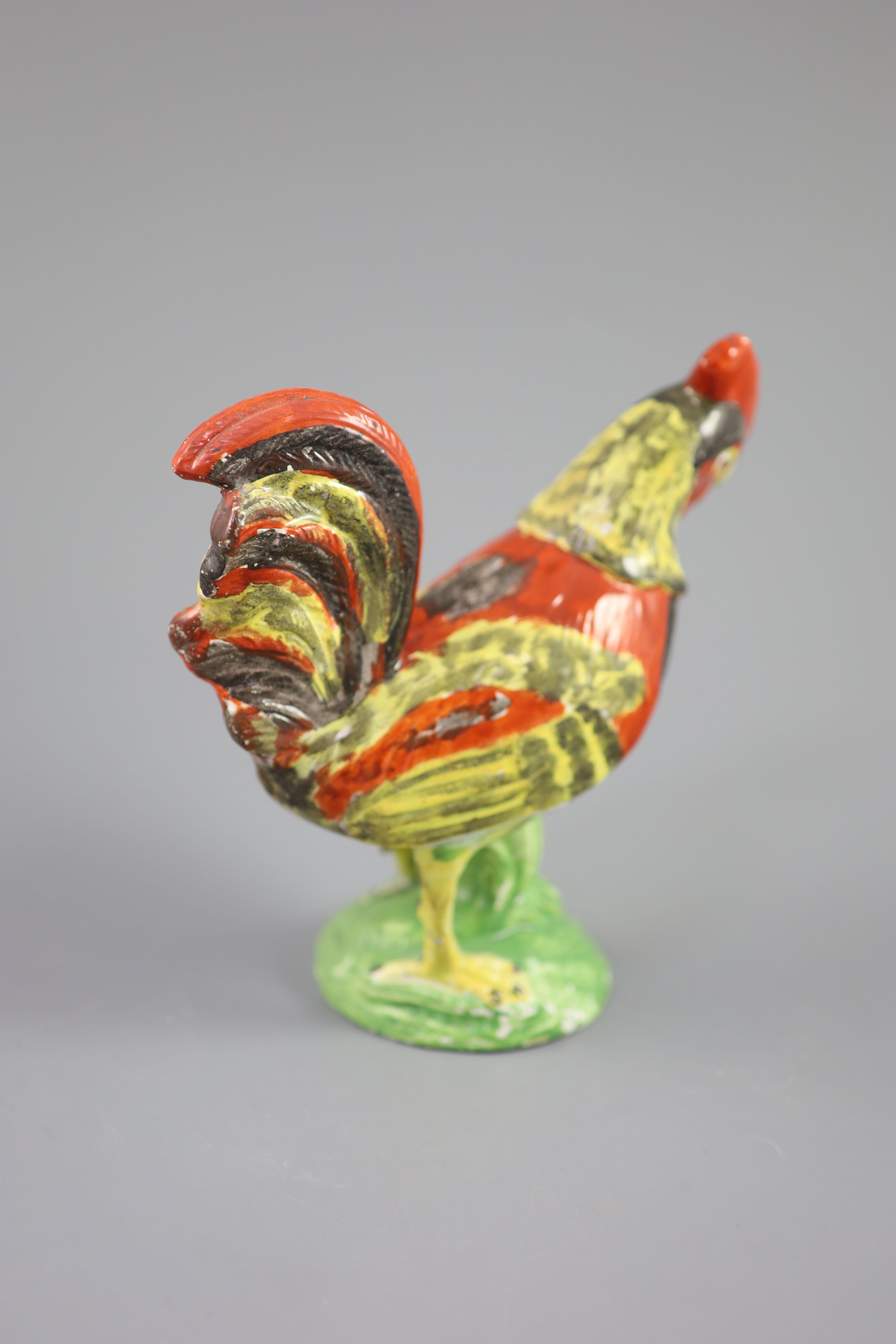 A Staffordshire pearlware figure of a cockerel, c.1820, 19cm high